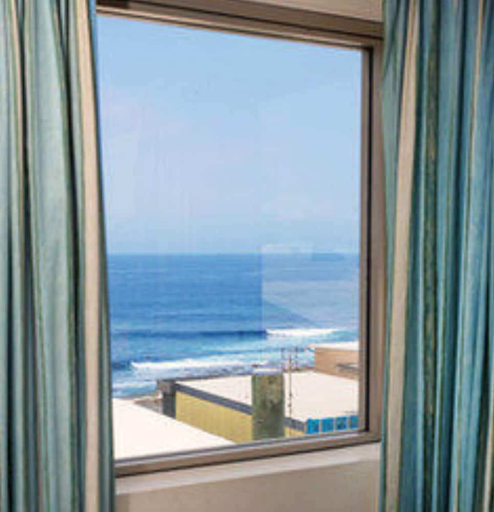 Фото Alloggio Newcastle Beach