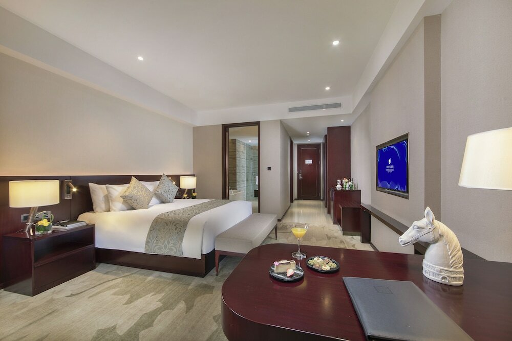 Фото Grand New Century Hotel Jingyue