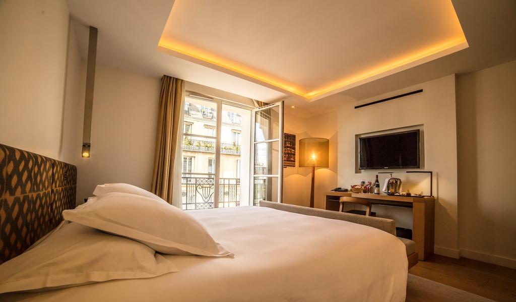 Фото Hôtel Marignan Champs Elysées