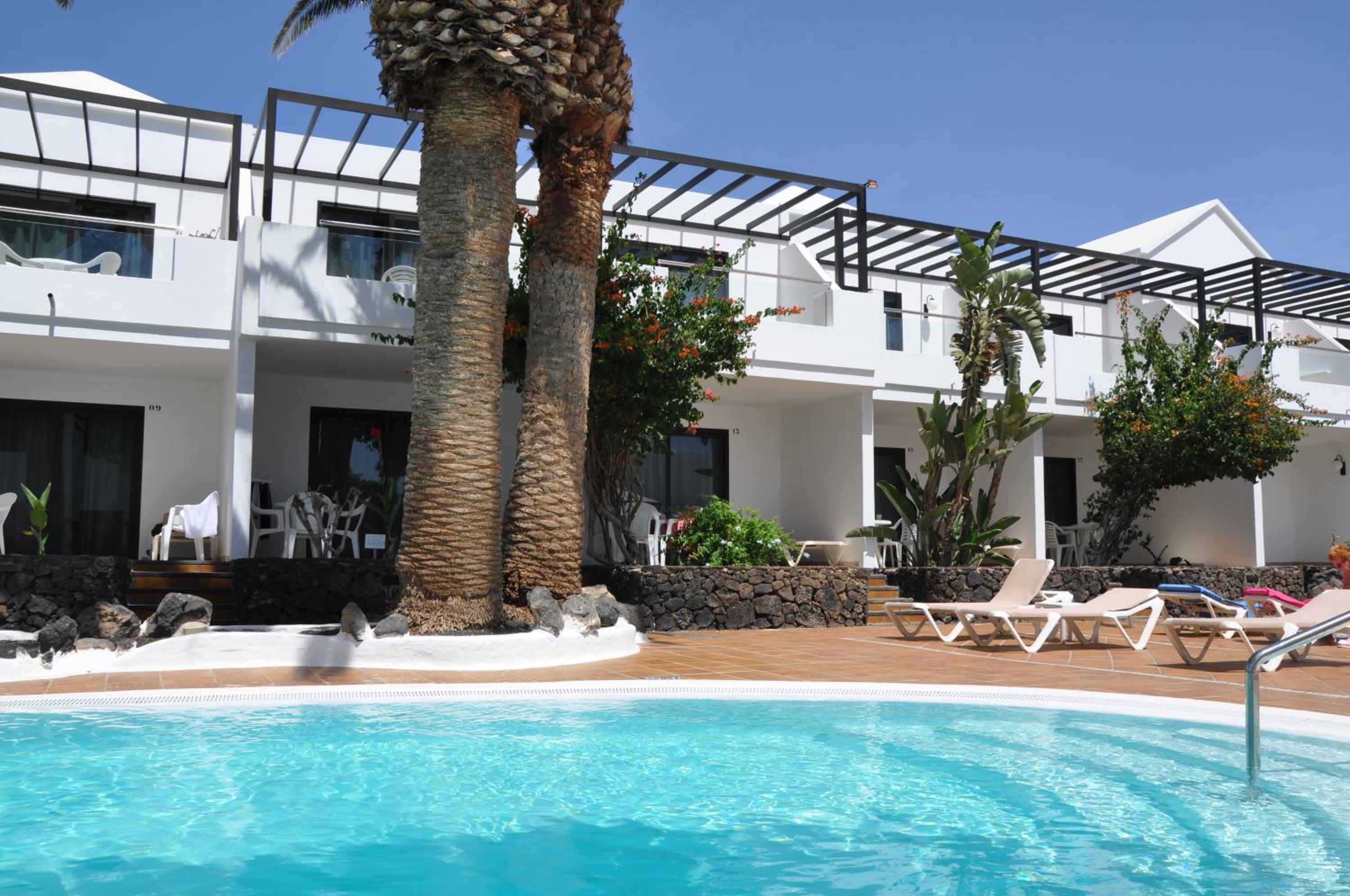 Фото Apartamentos Los Tulipanes