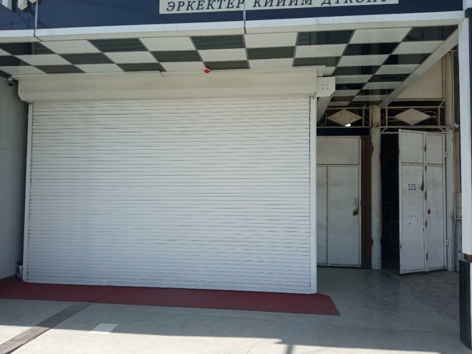 Clothing store New Millenium, Osh, photo