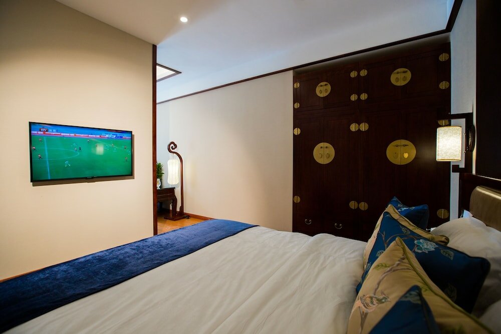 Фото Yitingzhenshe Hotel