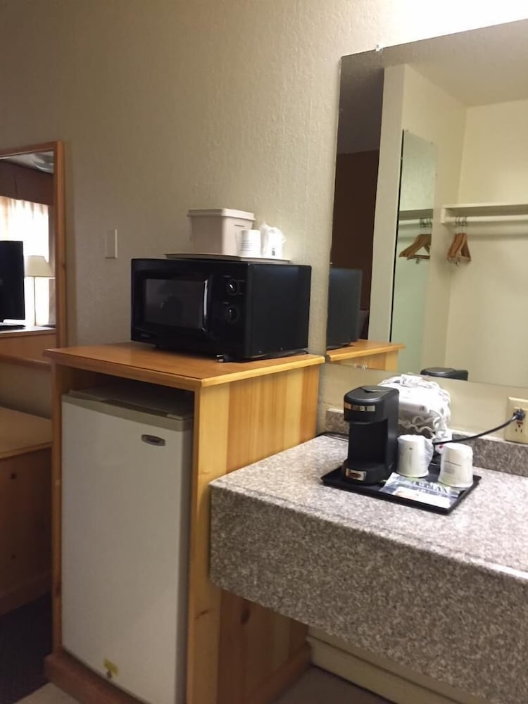 Фото Tiki Lodge Motel