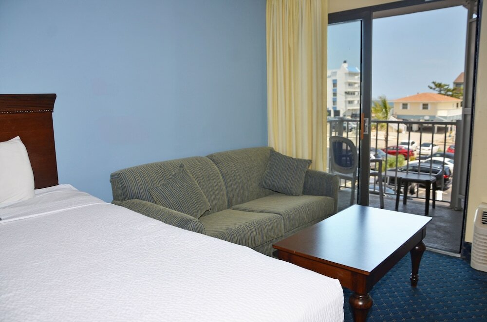 Фото Coastal Palms Inn & Suites