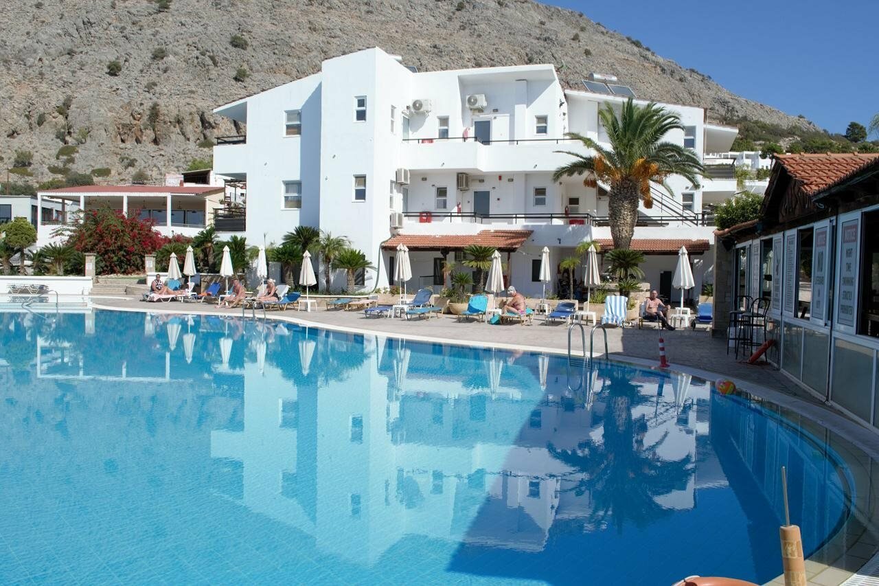 Фото Coliseum Studios & Apartments