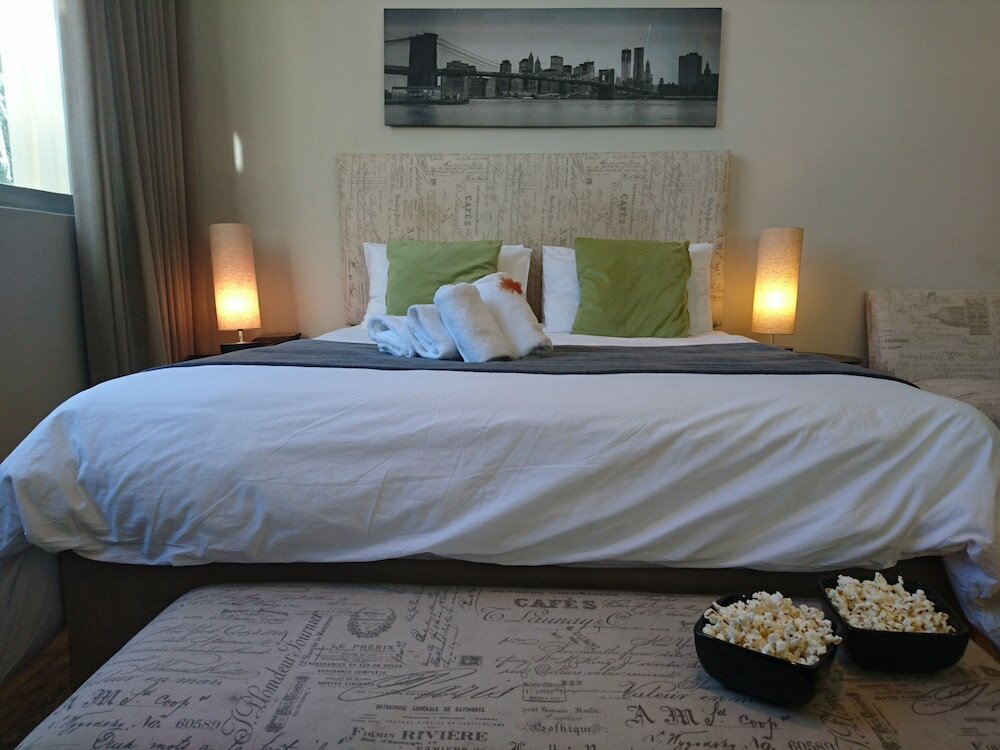 Фото The Square Apartments by Ctha