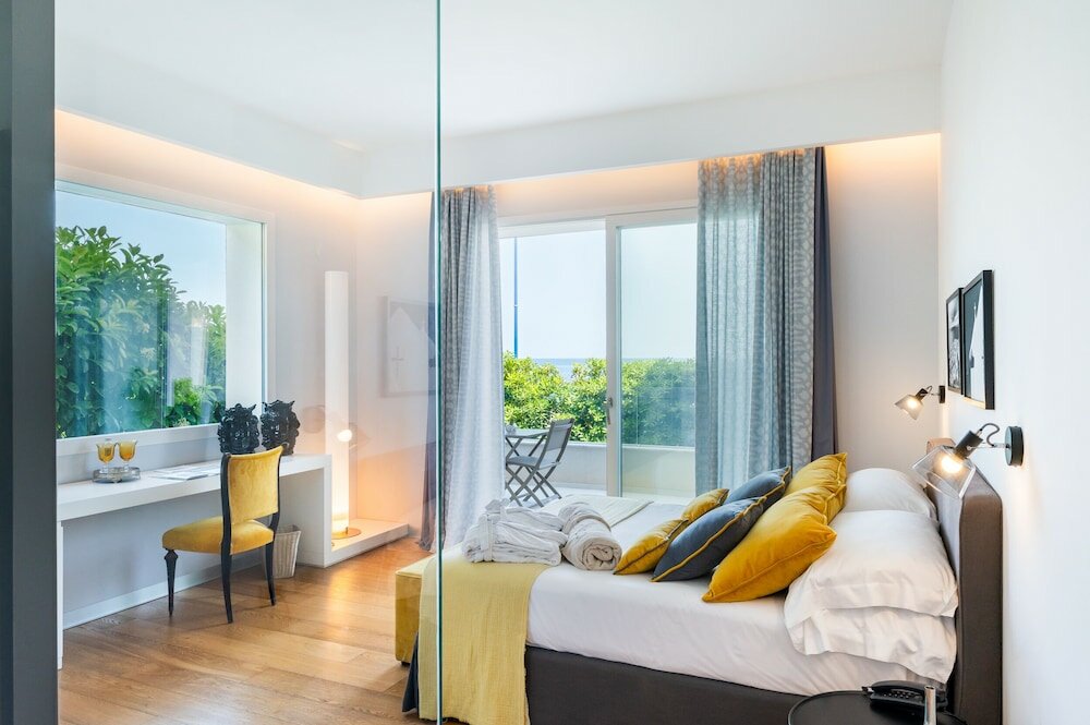 Фото Unìco Boutique Hotel d'Arte