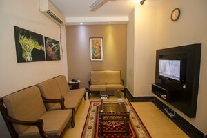 Апартаменты Rafflesia Serviced Apartments
