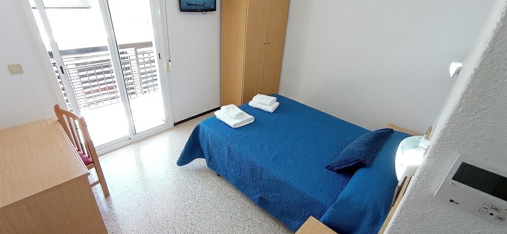 Фото Hostal El Mercat