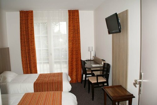 Внешний вид отеля Brit Hotel La Croix Blanche в Сент-Анн-д'Оре, фото 4