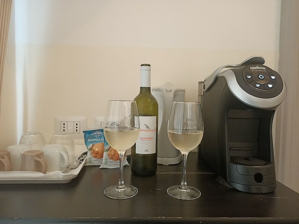 Фото Biancoreroma B&b