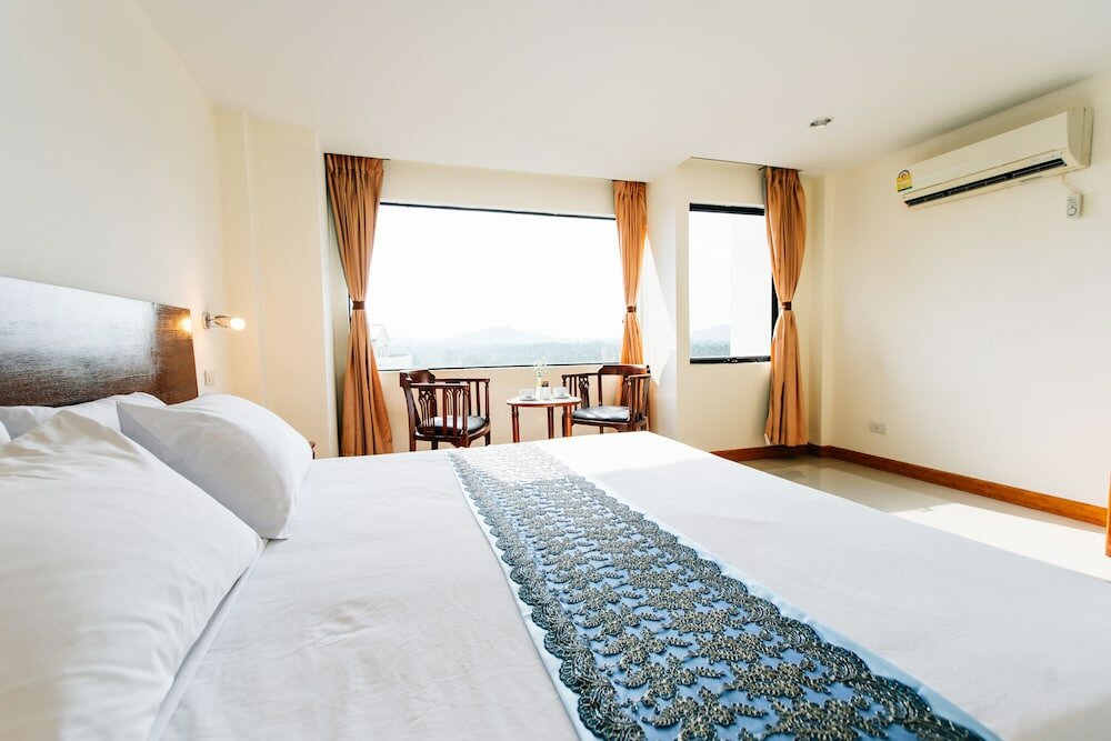 Фото Sinkiat Thani Hotel