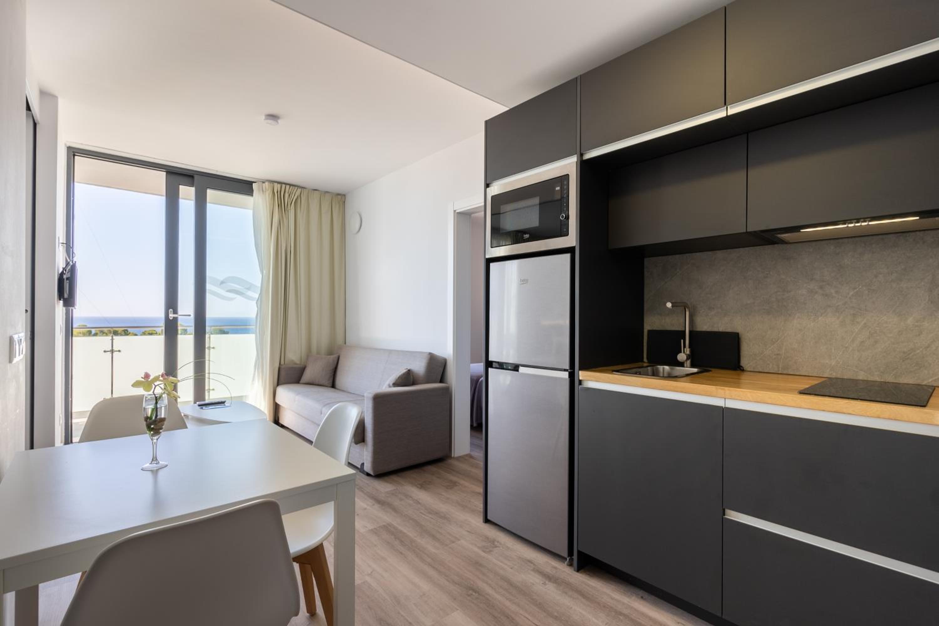 Фото Aparthotel Comtat Sant Jordi