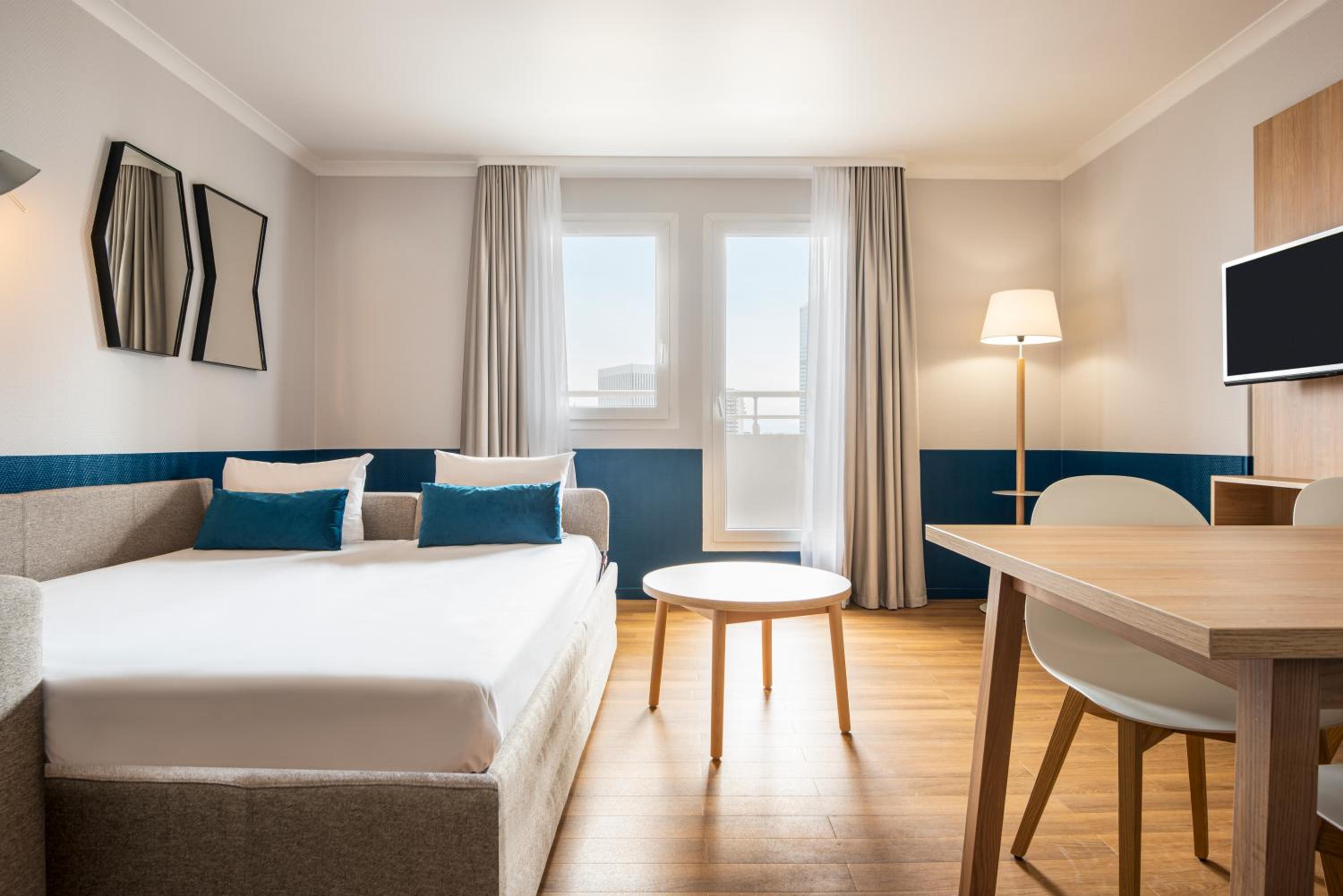 Фото Aparthotel Adagio La Défense Kléber