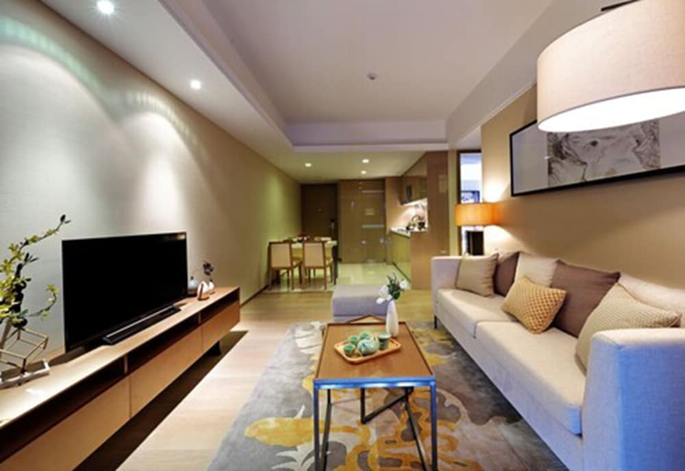 Фото Yuwa Serviced ApartHotel