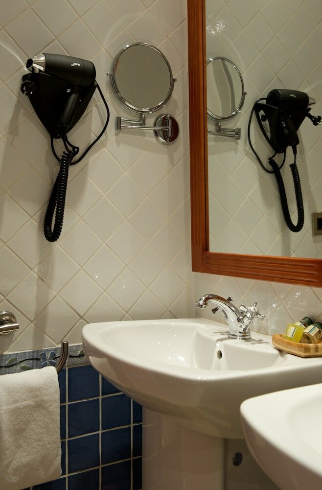 Фото Aparthotel Capitolina