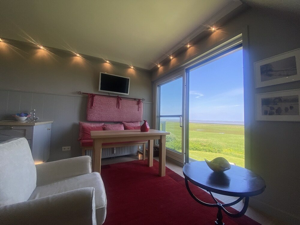 Фото Ferienwohnung Feskerdam 28 Og