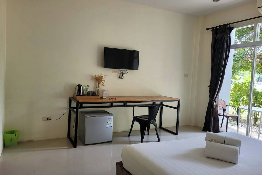 Фото Snooze Inn Phuket