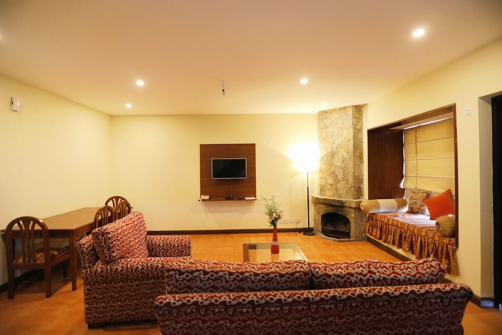 Фото Woodsvilla Resort