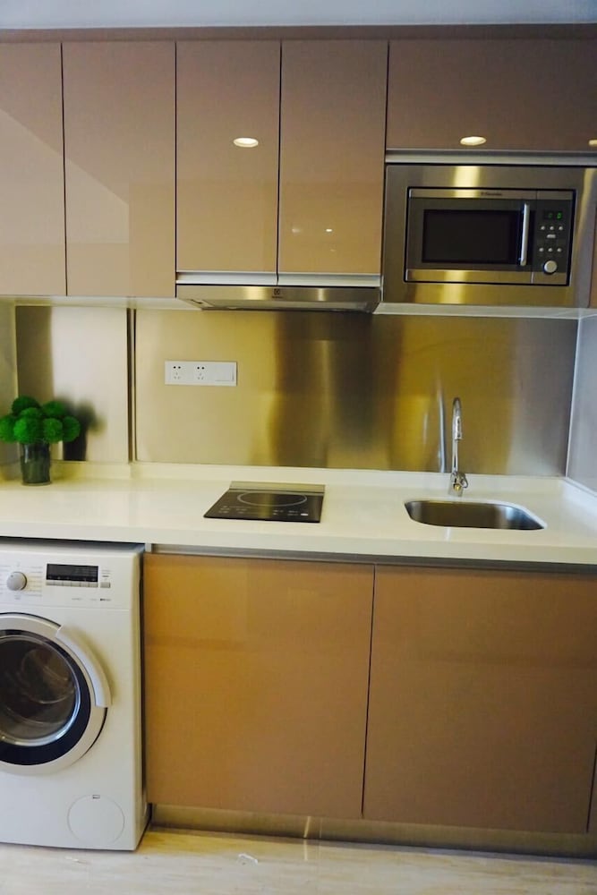 Фото Yuwa Serviced ApartHotel