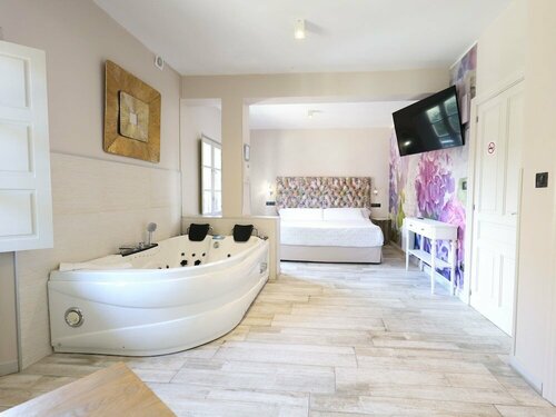 Апартаменты Suites con Jacuzzi Santillana в Сантильяне-деле-Маре