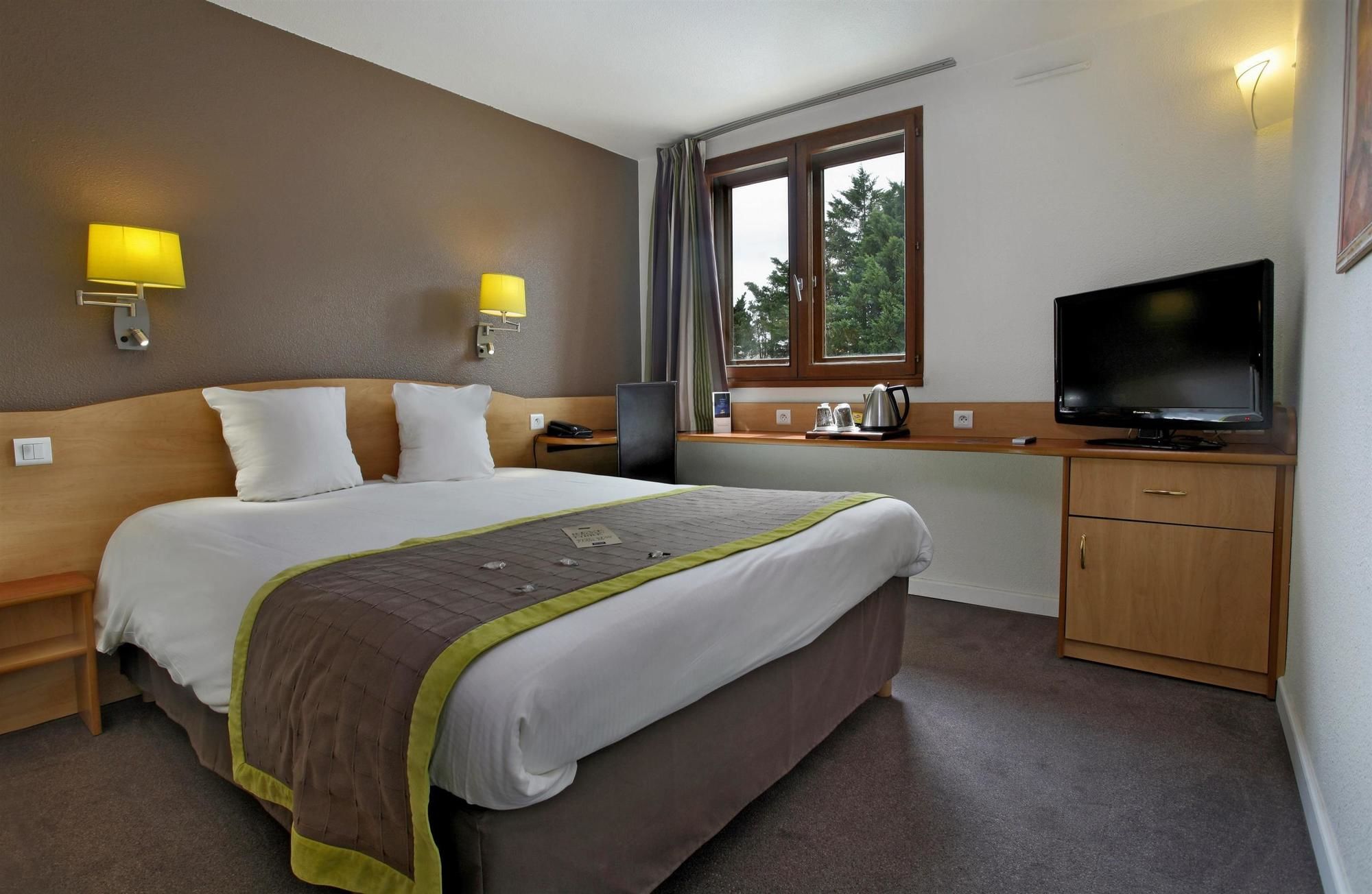 Фото Kyriad Montpellier Aeroport Gare Tgv Sud de France