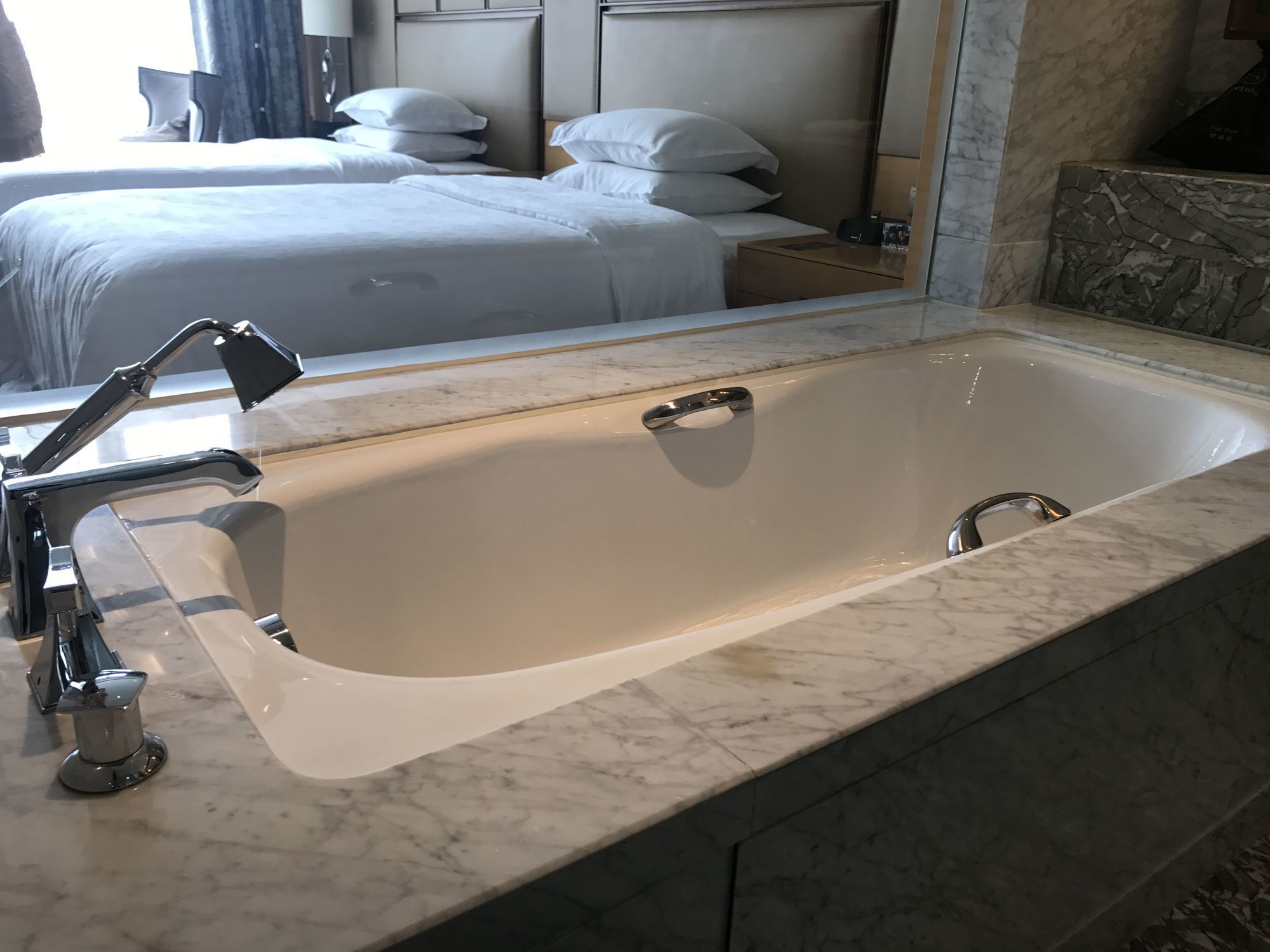 Фото Sheraton Qingdao Jiaozhou Hotel