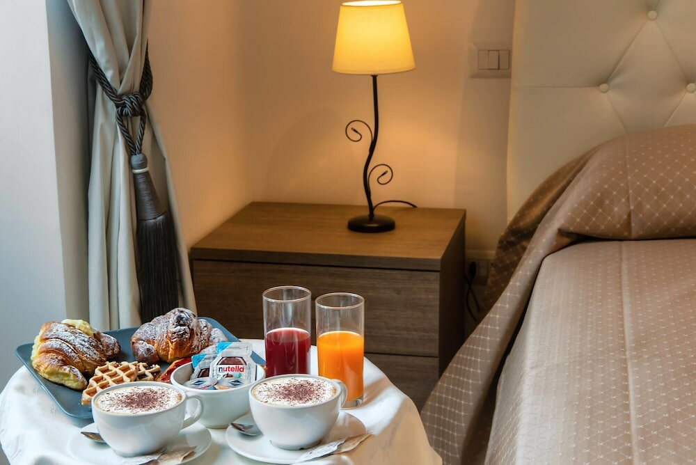 Фото Rome Central Rooms Guest House o Affittacamere