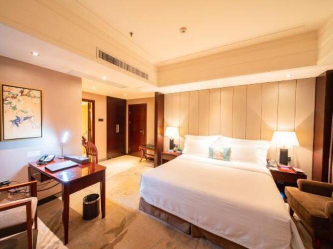 Фото Fuqinglong Huatian Holiday Hotel