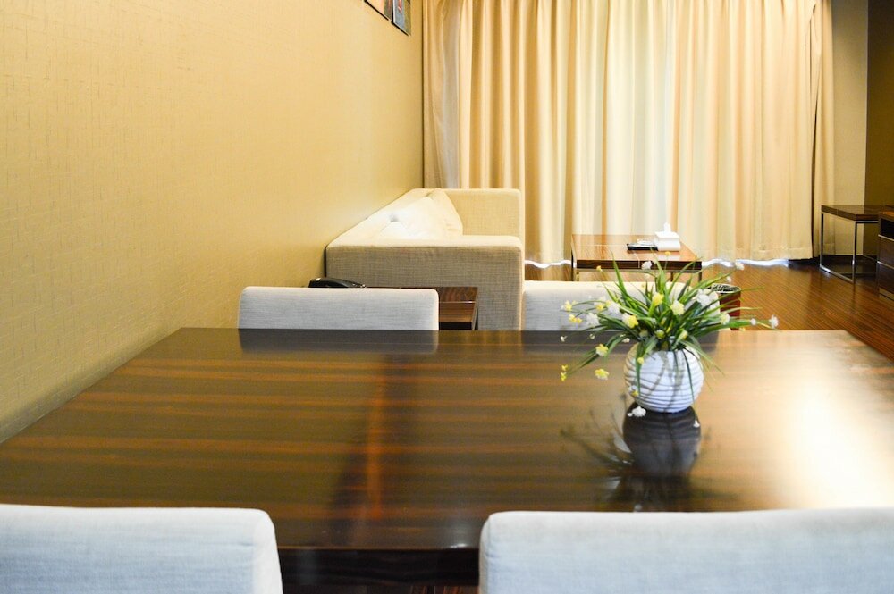 Фото Xingyi International Hotel Poly Store