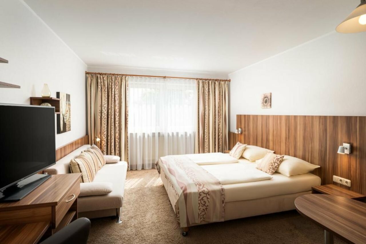 Фото Qu Hotel Augsburg