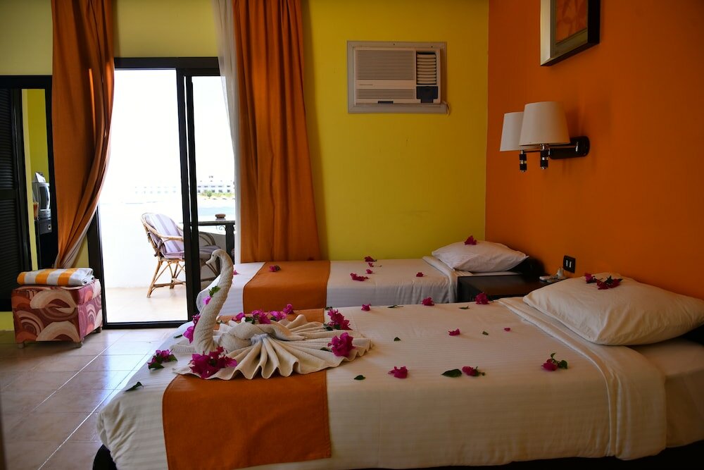 Фото Coral Garden Beach Resort