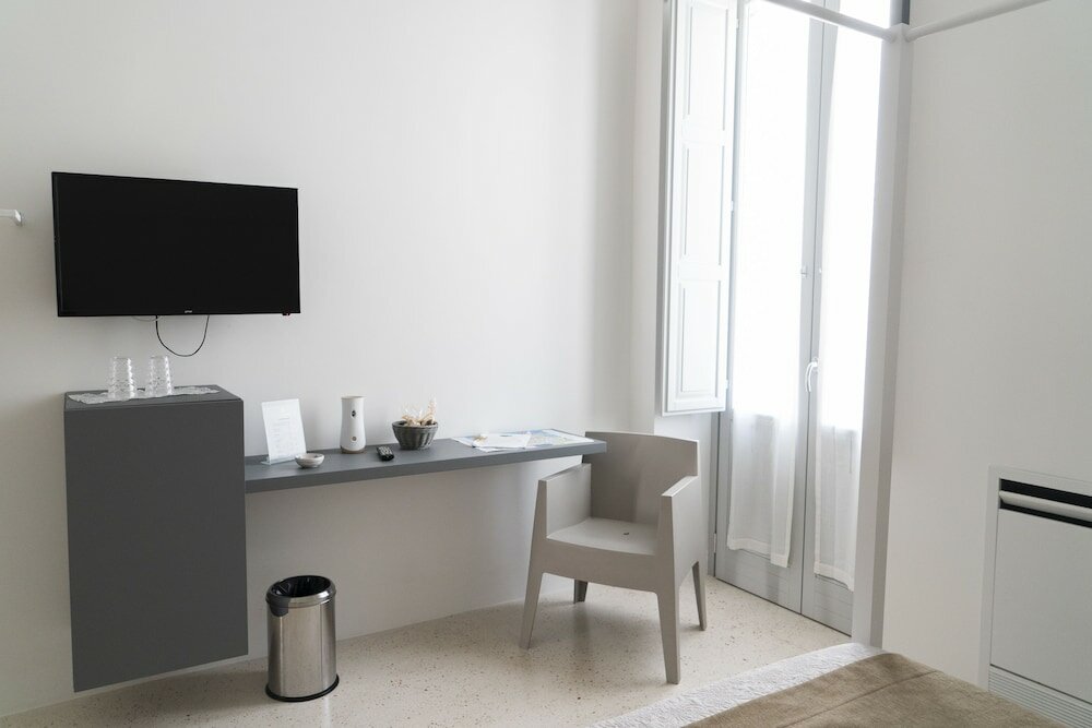 Фото Donna Domenica Boutique Suites