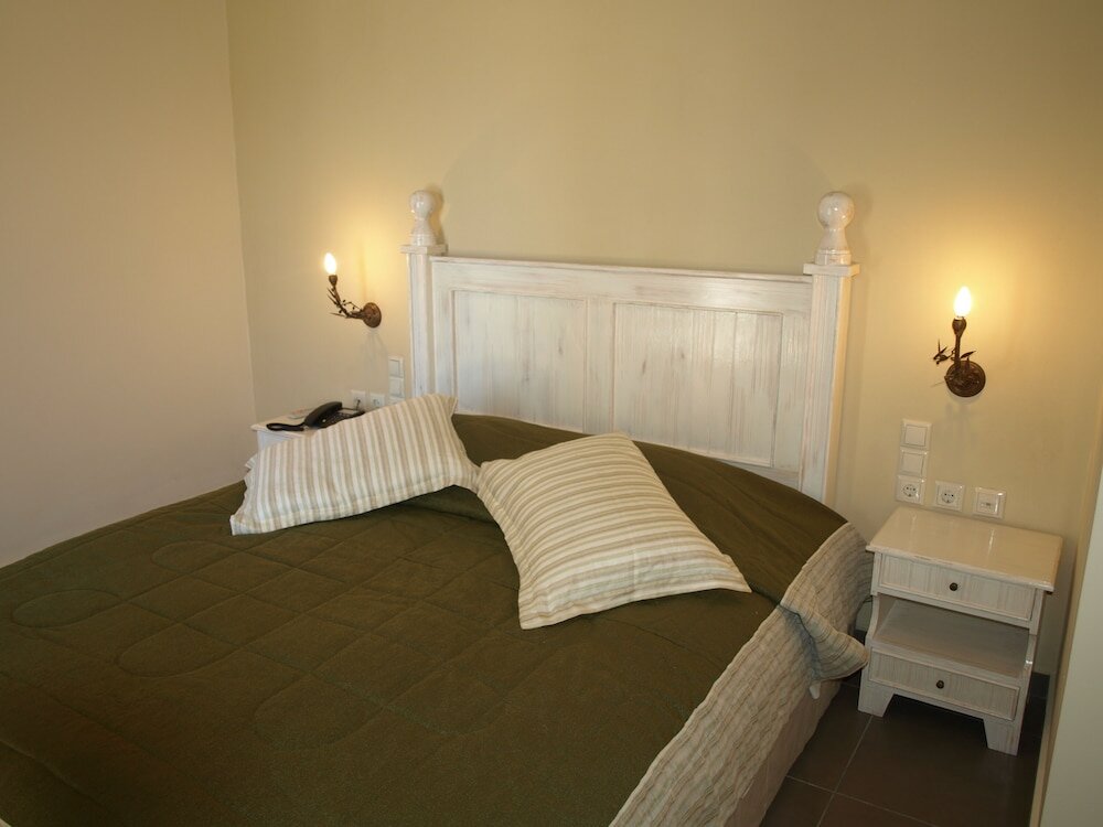 Фото Porto Mani Suites