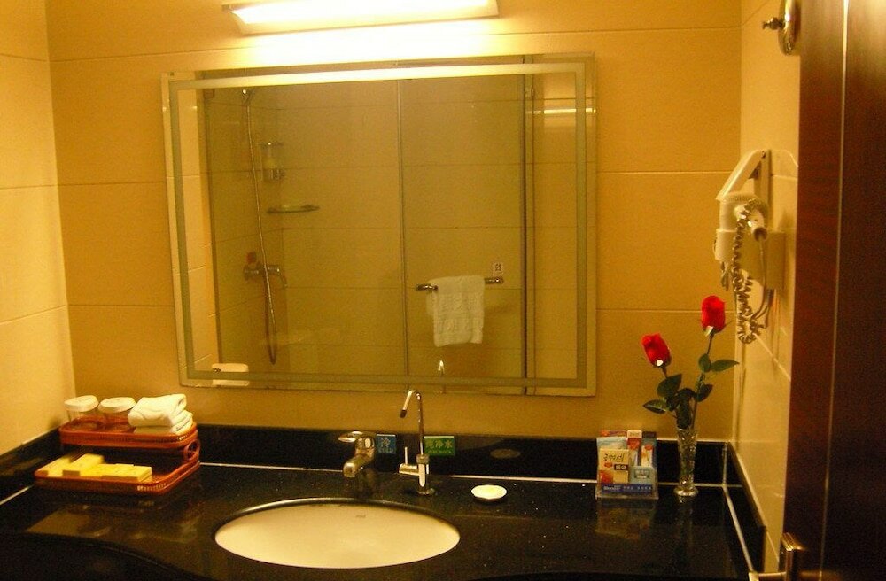 Фото Qingdao Qiulin Hotel