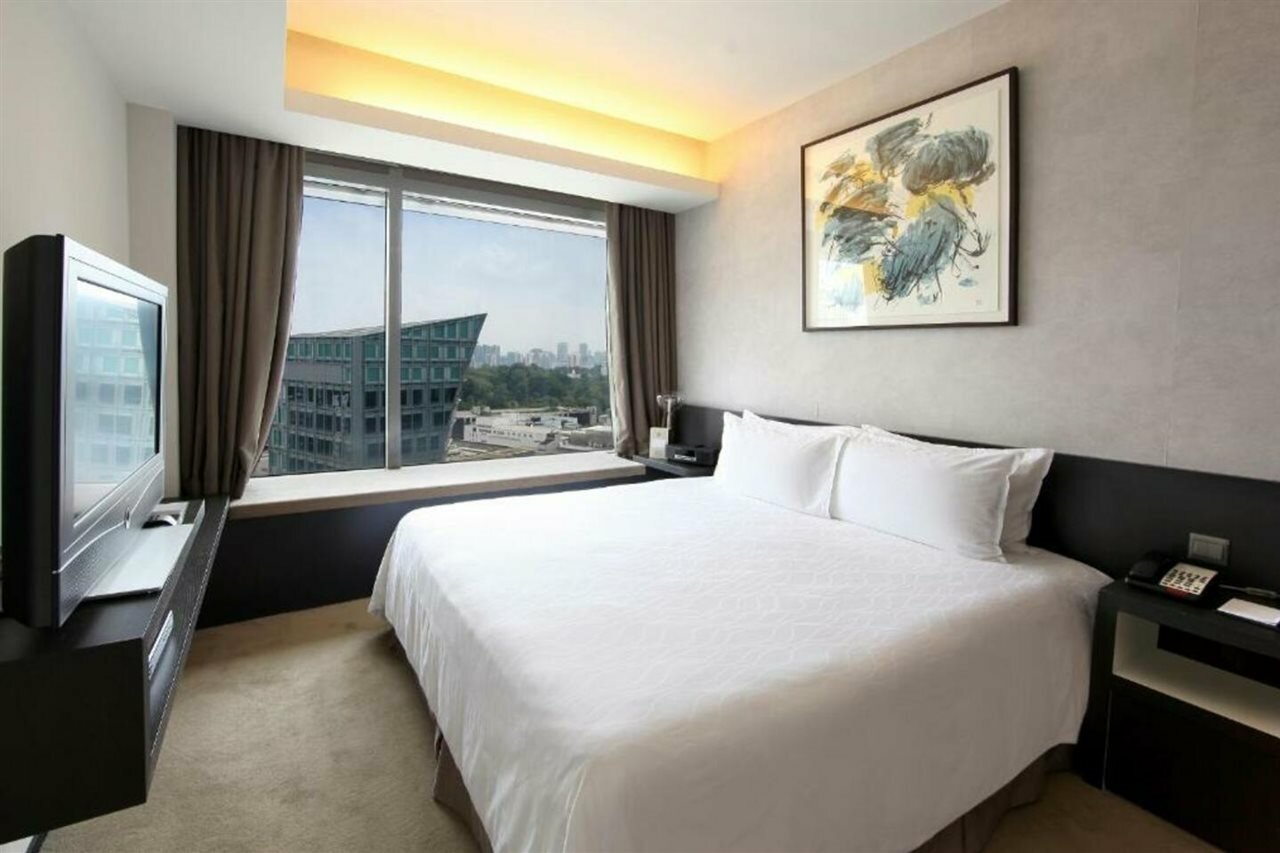 Фото Pan Pacific Serviced Suites Orchard, Singapore