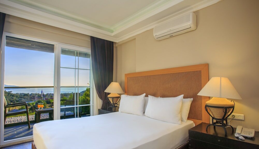 Фото Manaspark Deluxe Hotel Ölüdeniz