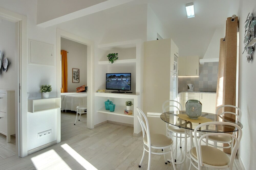 Фото Apartamentos Tucha