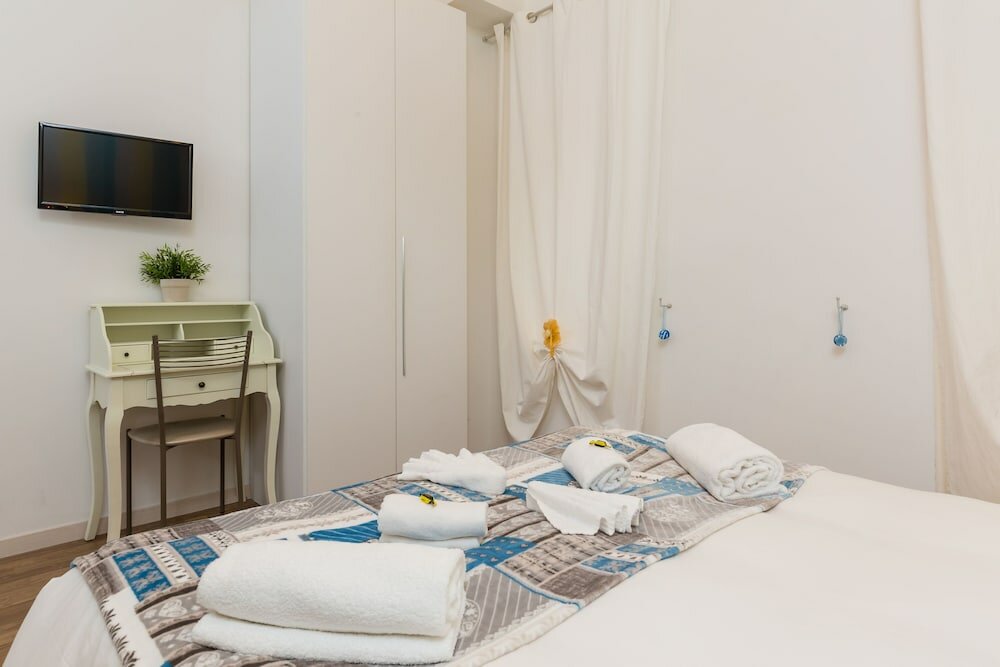 Фото Rione Monti Suites