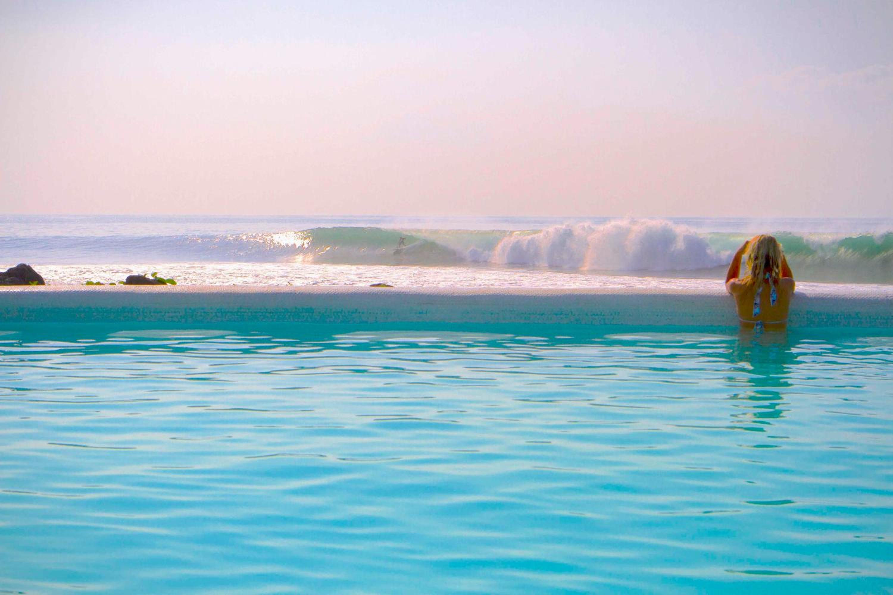 Фото Komune Resort & Beach Club Bali