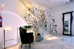 Гостиница DormirDCine Madrid
