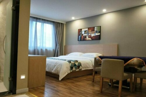Гостиница Shell Shanghai New International Expo Center Fanghua Road Metro Station Hotel в Шанхае