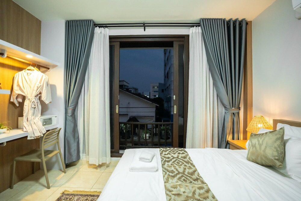 Фото Vongkhamsene Boutique Hotel