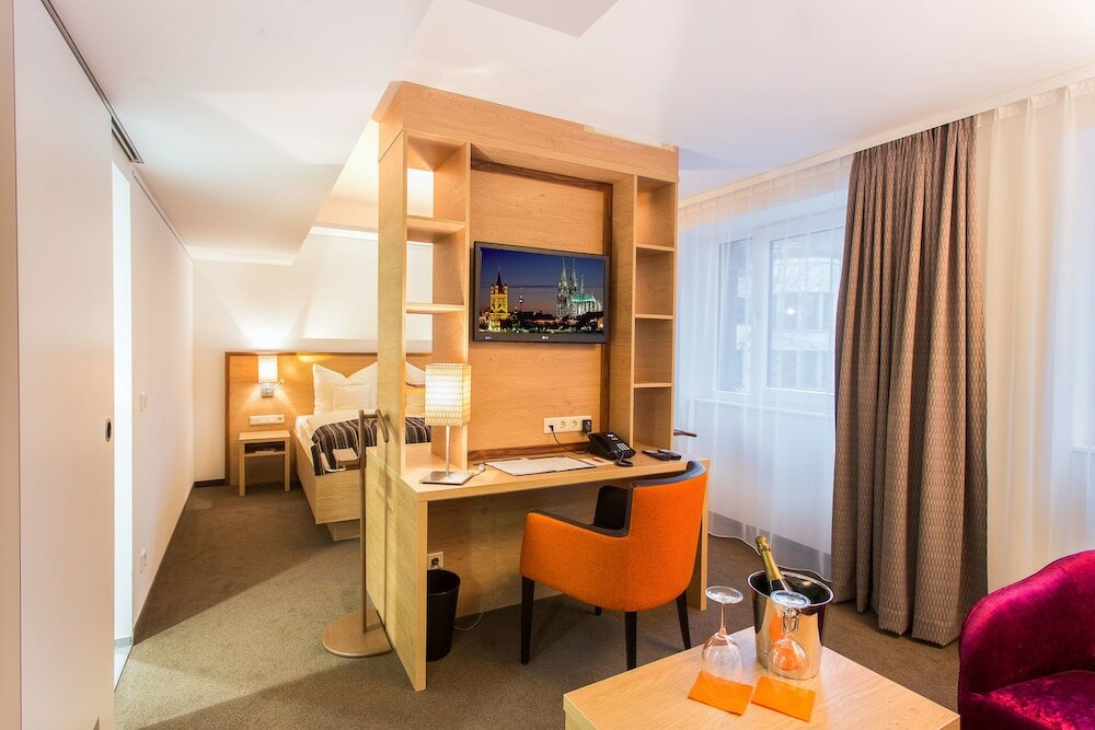 Фото Stadthotel am Römerturm