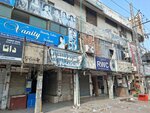 Mobeen Shopping Center (Allama Iqbal Town, Umar Block, Noor-ul-Amin Road, 55), shopping mall