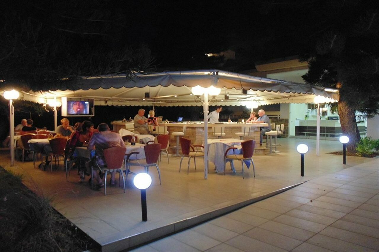 Фото Paleos Apartments