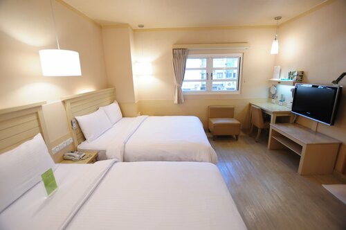 Гостиница Kindness Hotel Min Sheng в Тайнани