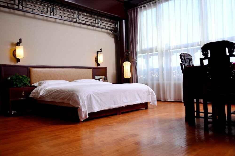 Фото Yitingzhenshe Hotel