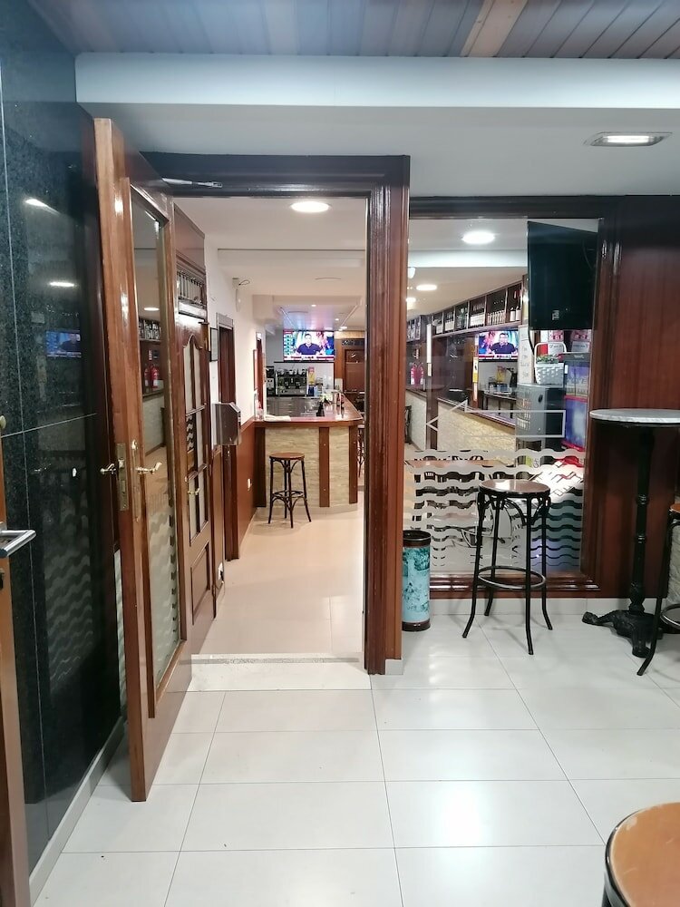 Фото Hostal Adelia