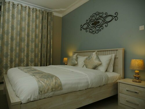 Гостиница Ivory Castle Boutique Hotel в Кампале